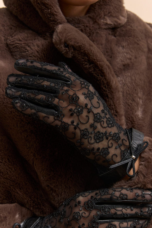 Lace and leather gloves