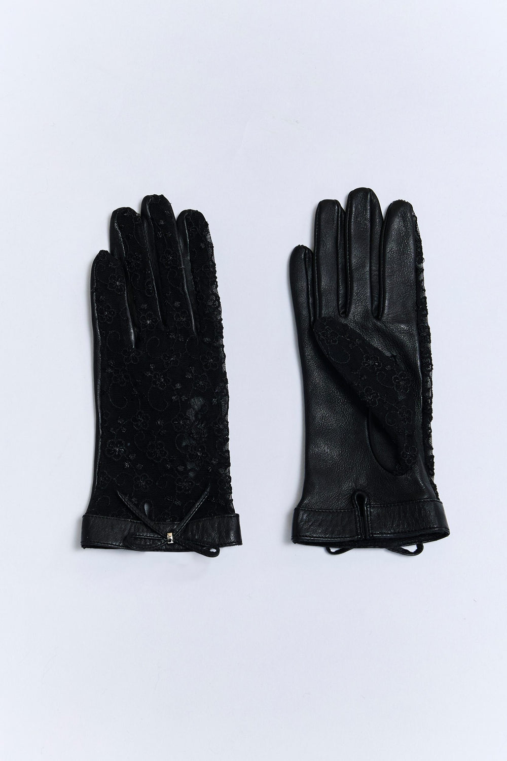 Lace and leather gloves