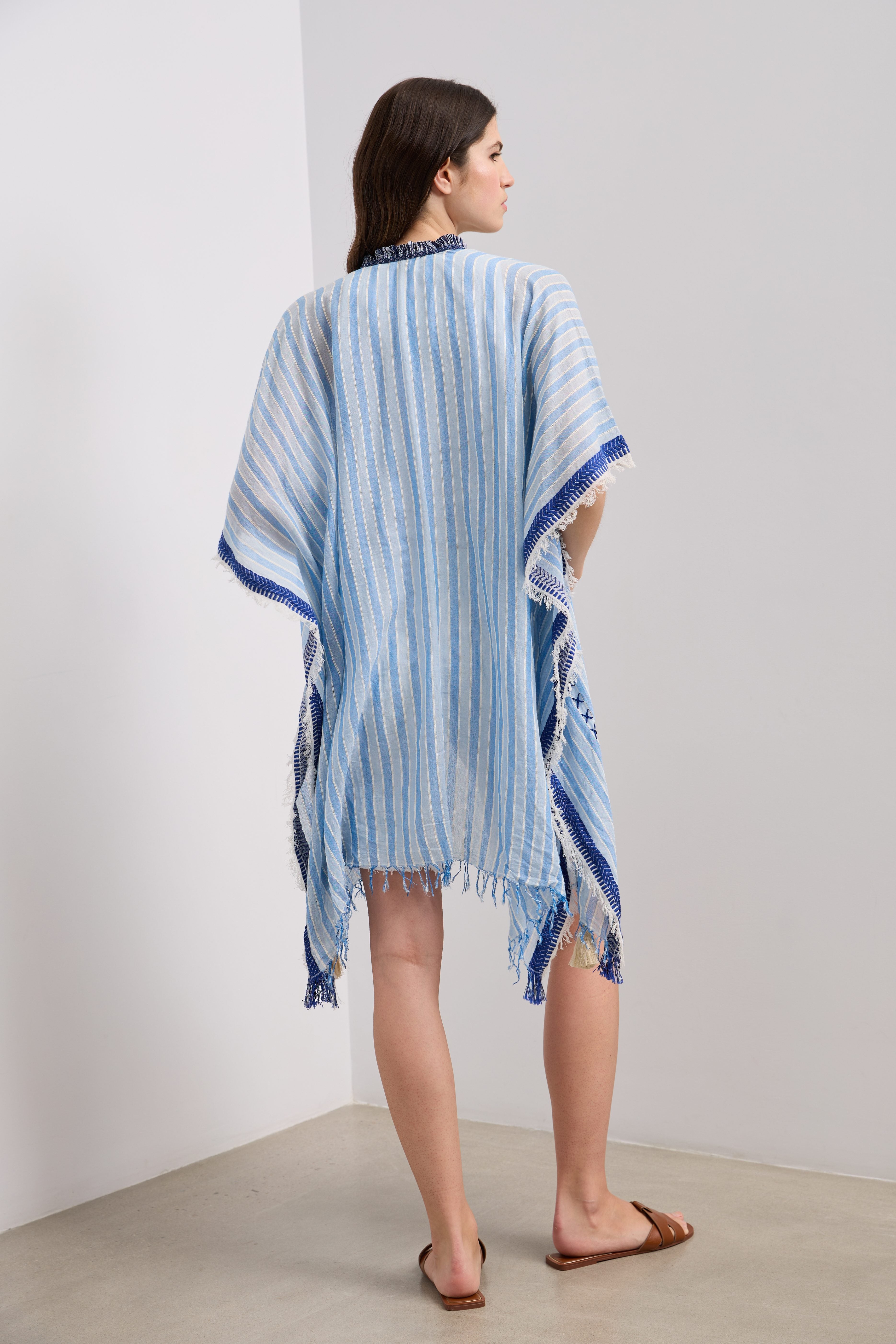 Striped cape with fringes