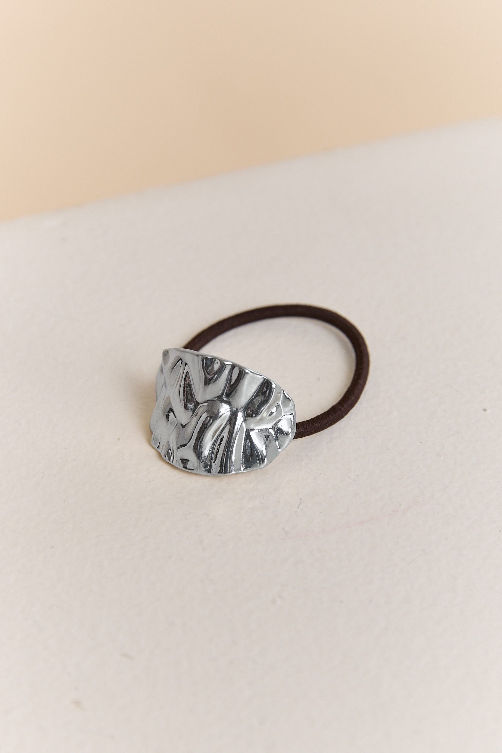 Textured metal hair tie