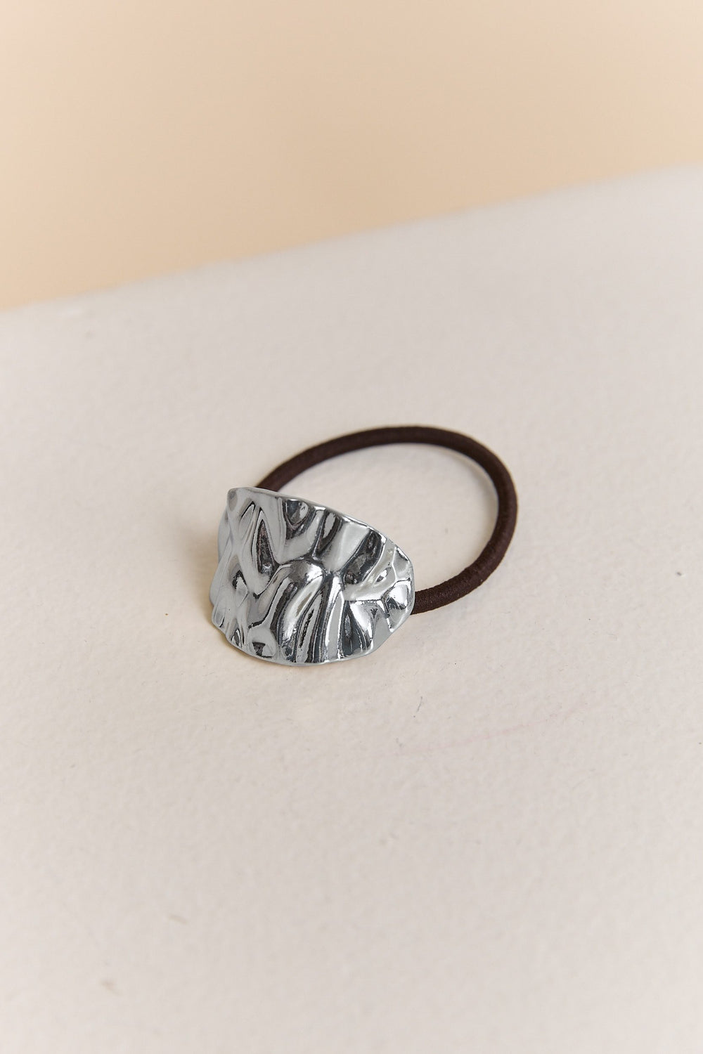 Textured metal hair tie