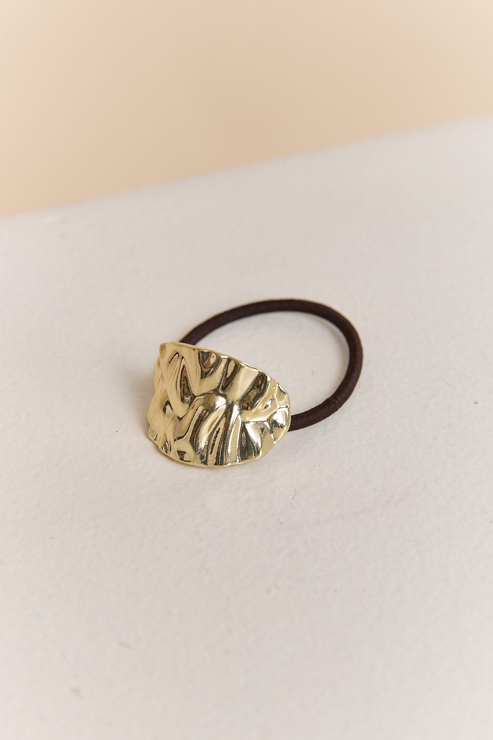 Textured metal hair tie