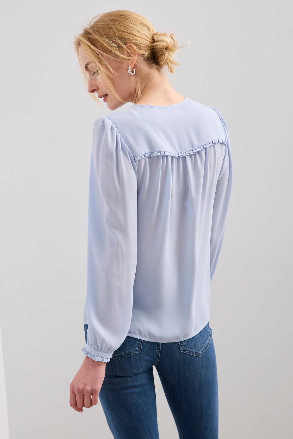 Blouse with frill and buttons in the front