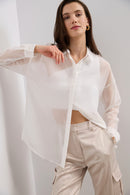 Sheer oversized blouse with open back