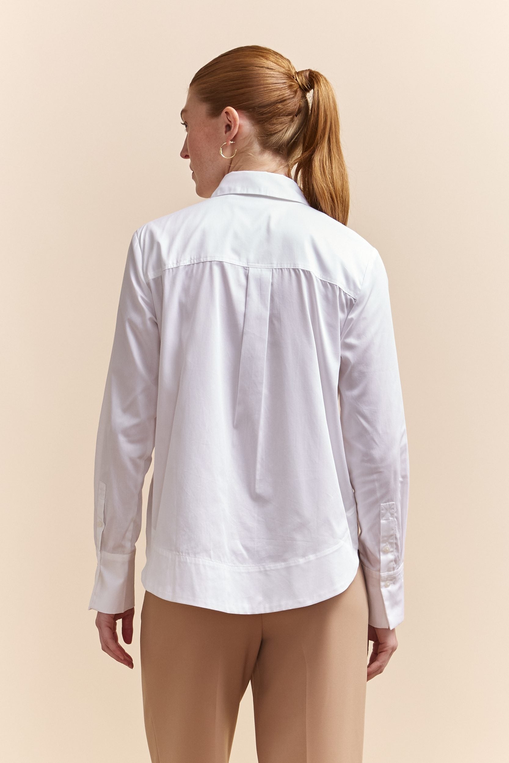 Oversized shirt with applied pocket