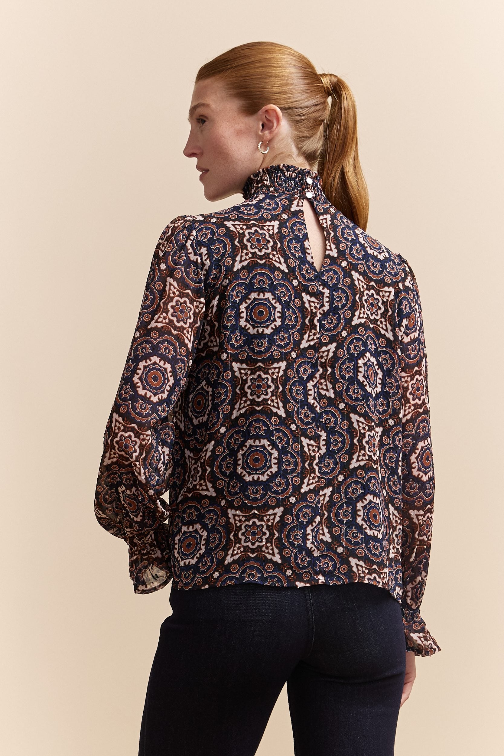 Fluid printed blouse with ruching