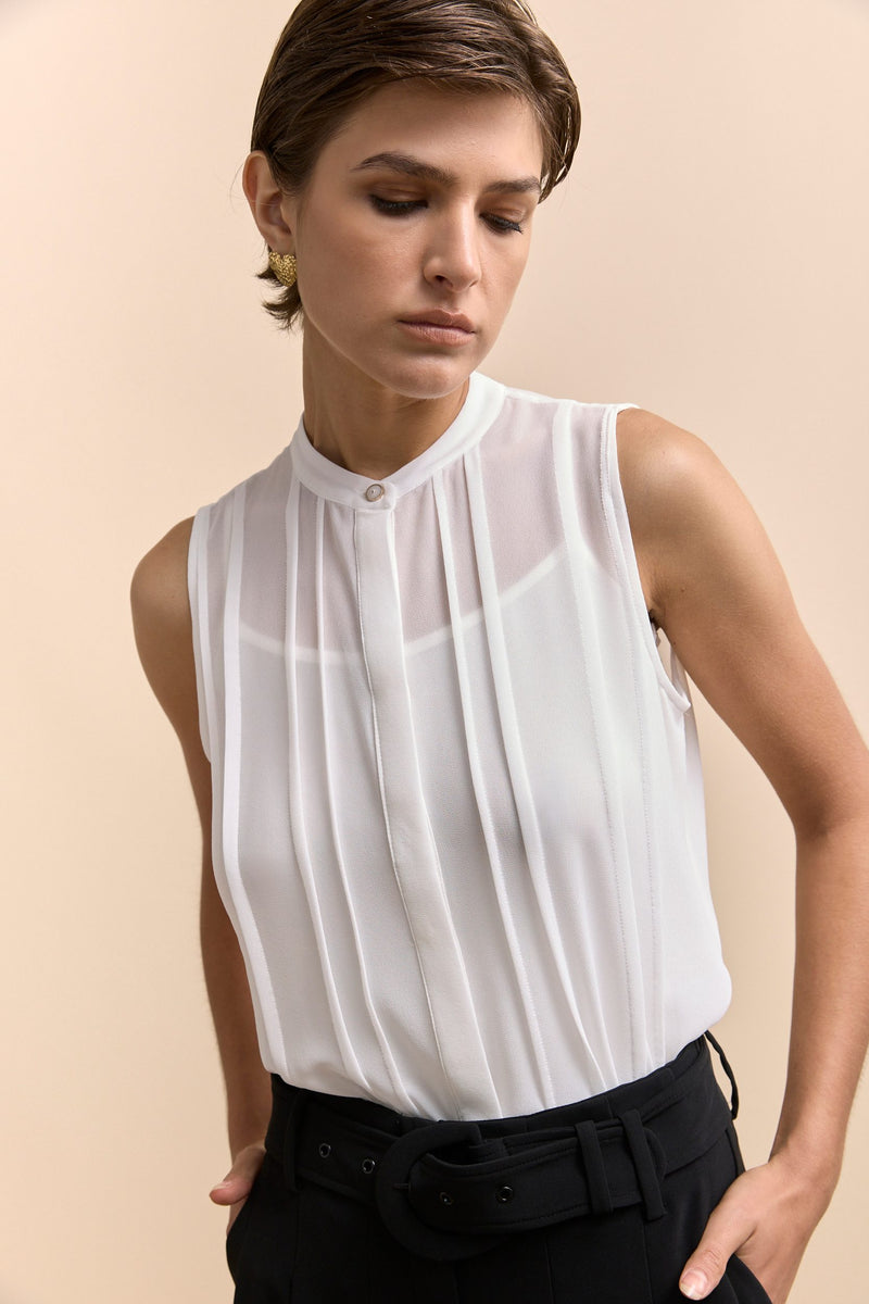 Sleeveless top with pleats