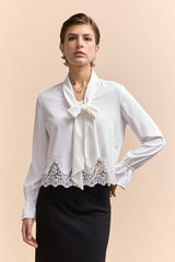 Cropped blouse with lace hem