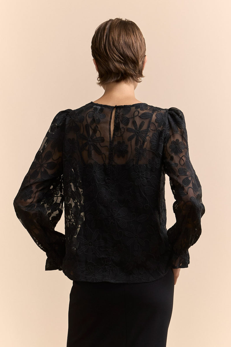 Blouse with flared cuff