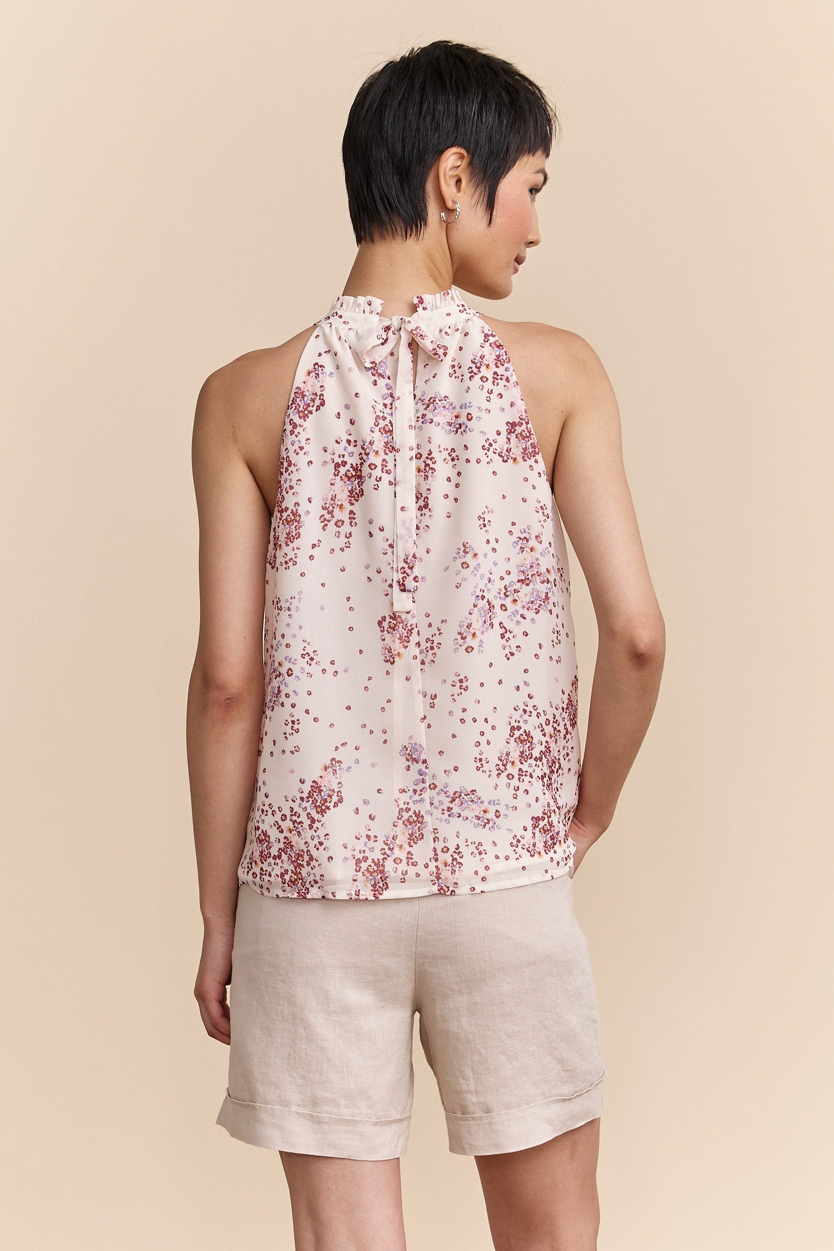 Floral printed halter top tied at back