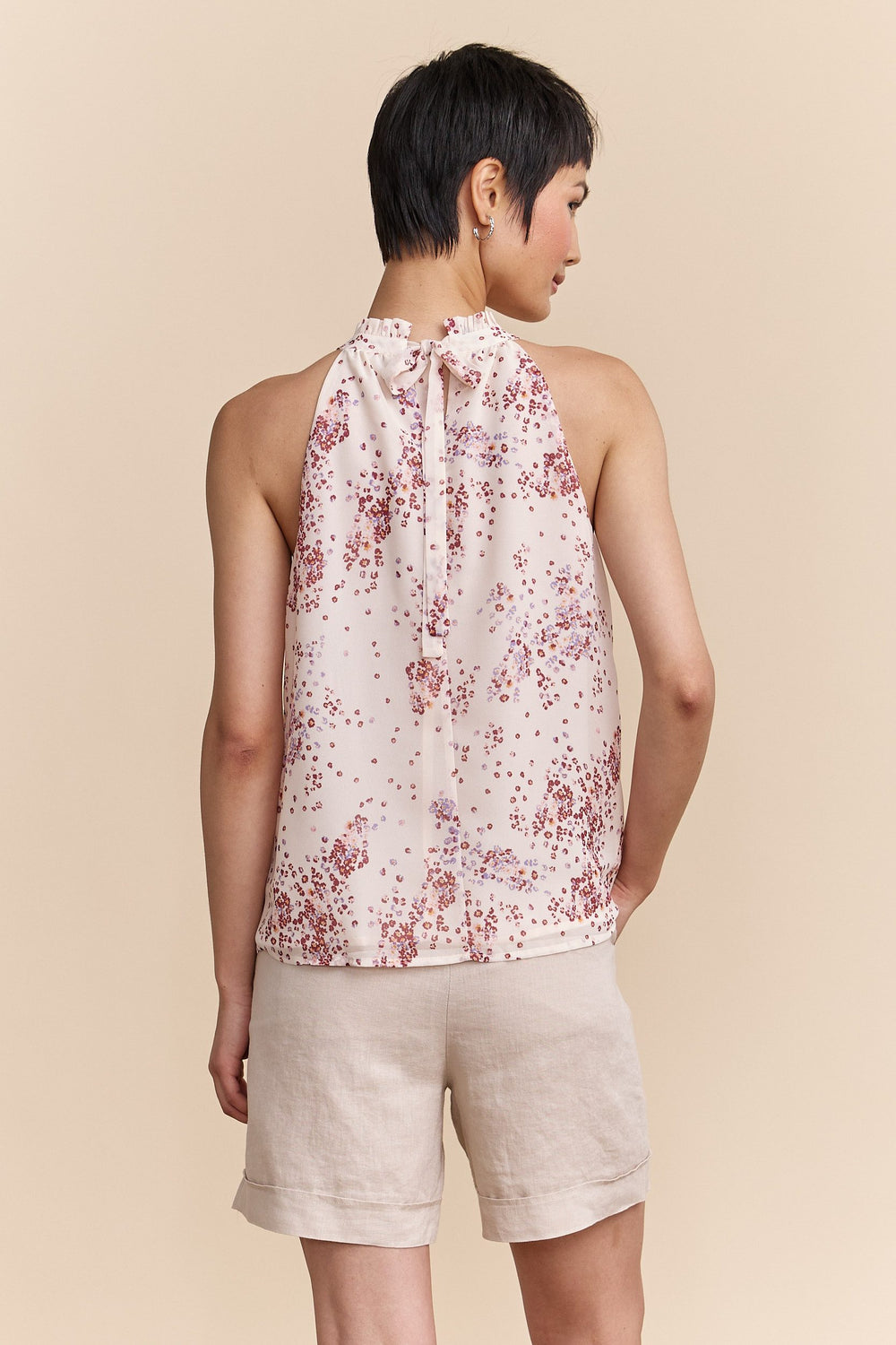 Floral printed halter top tied at back