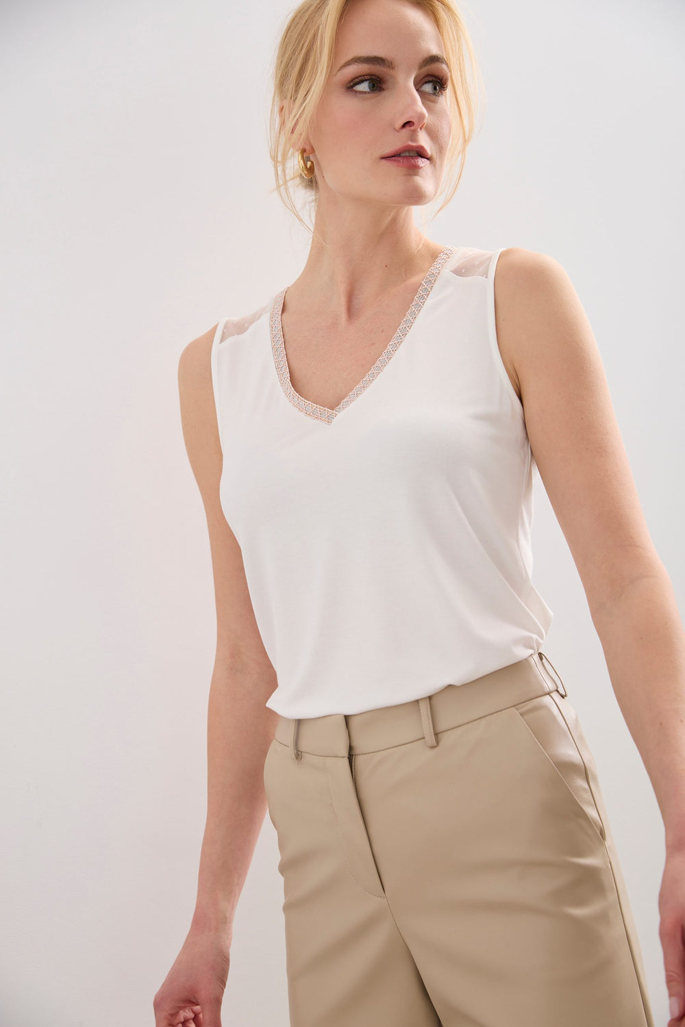 Sleeveless top with lace yoke
