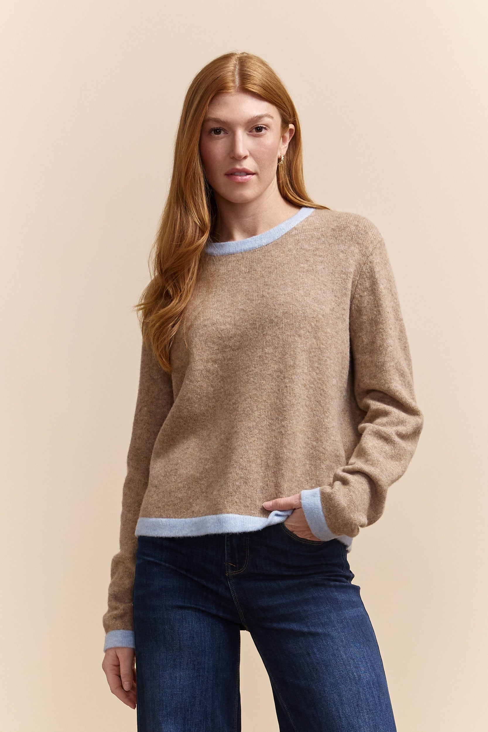 Sweater with contrasting color ribs