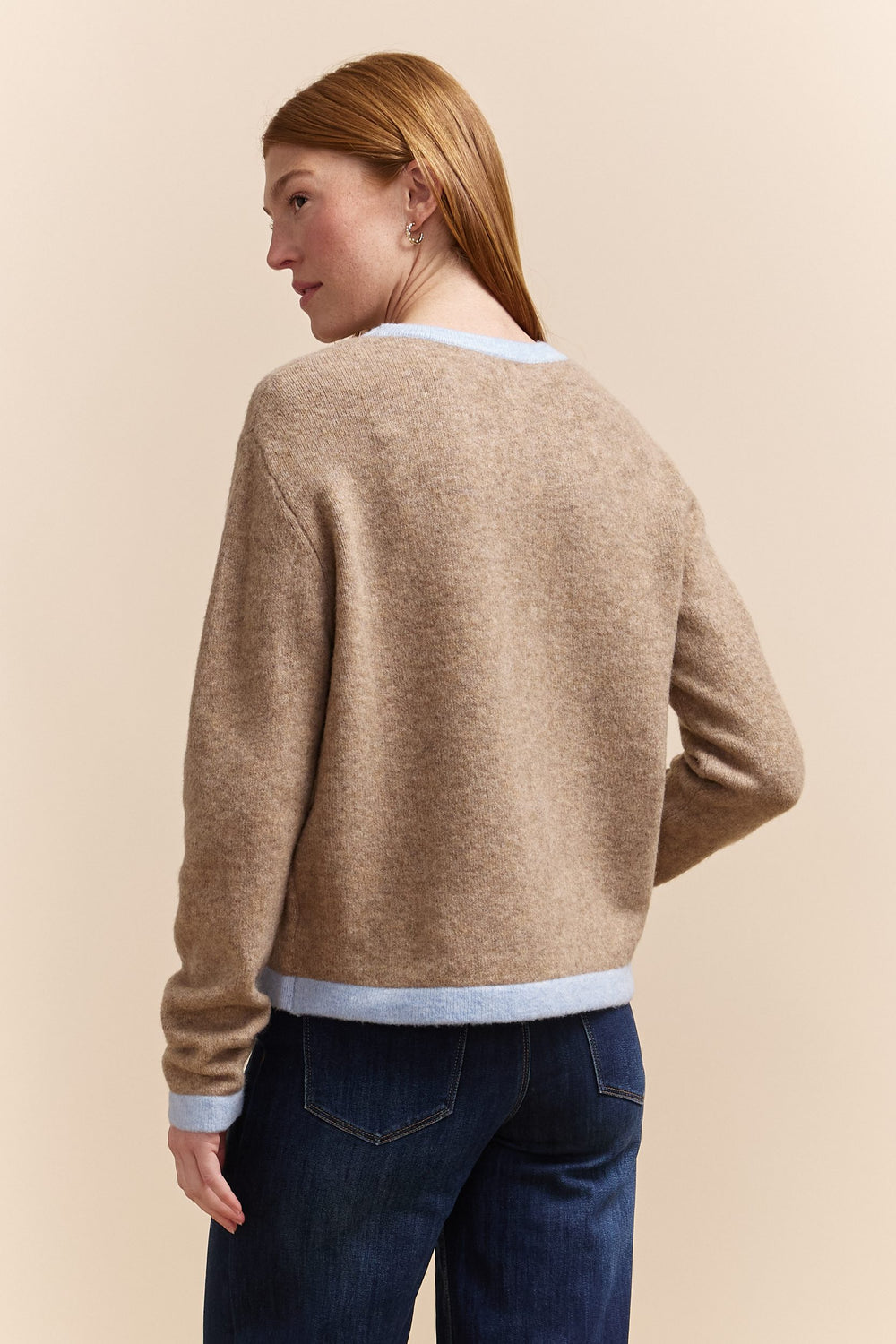 Sweater with contrasting color ribs