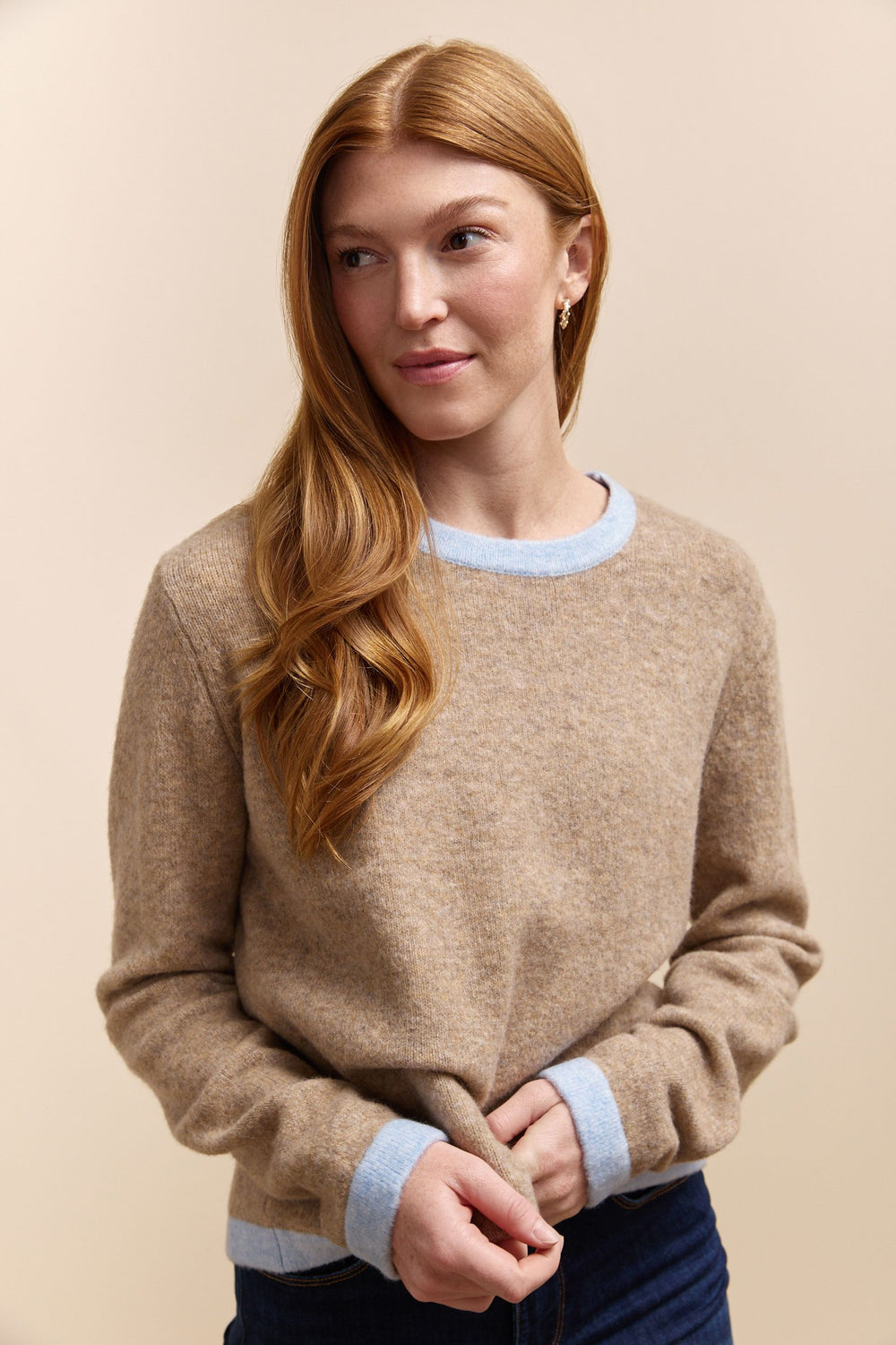 Sweater with contrasting color ribs