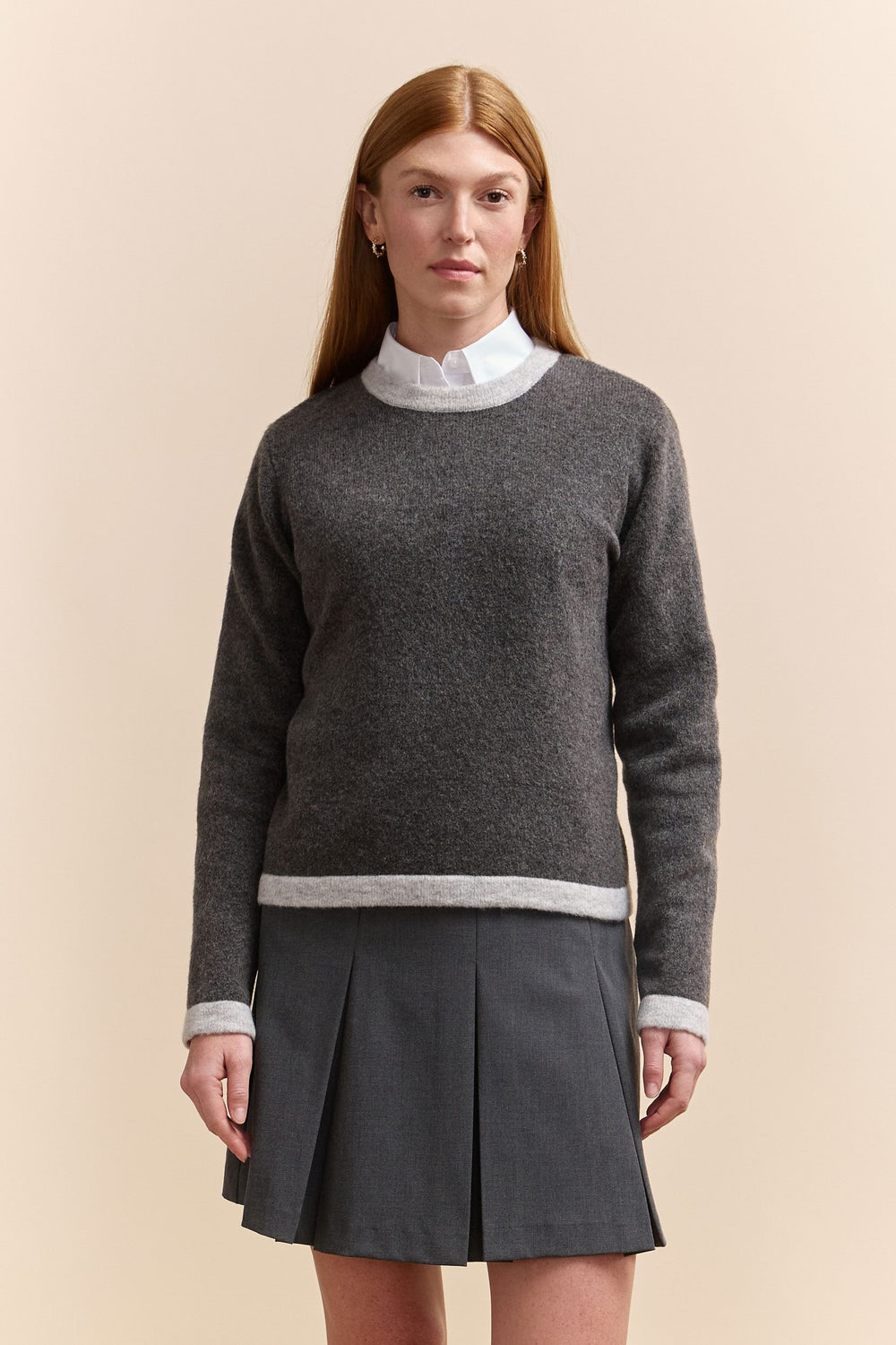 Sweater with contrasting color ribs