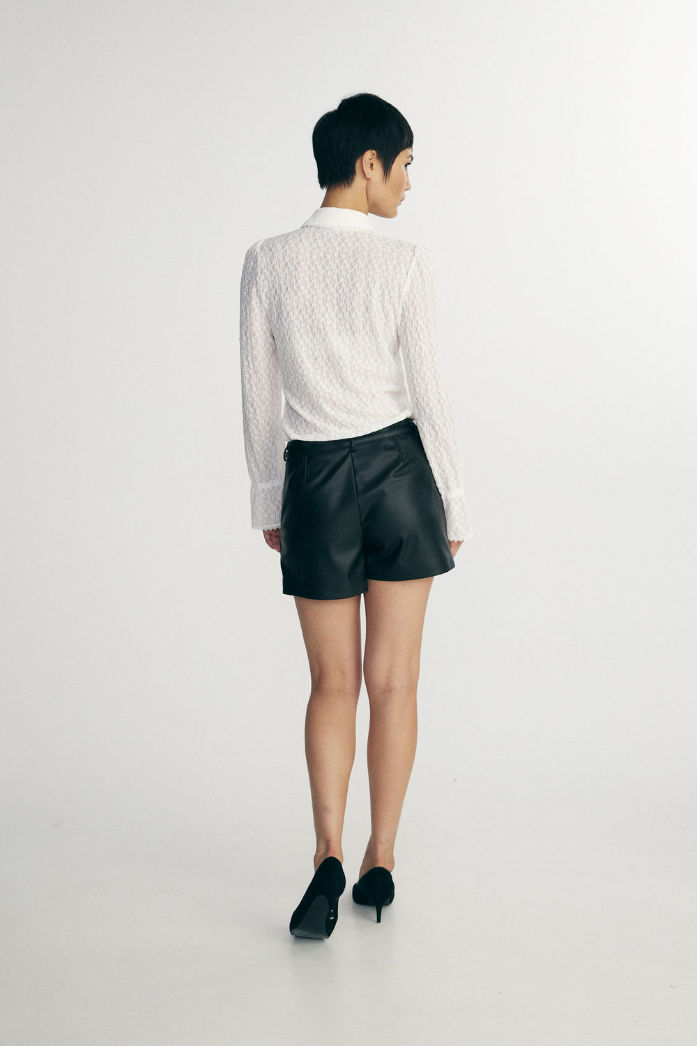 High-waisted faux leather shorts