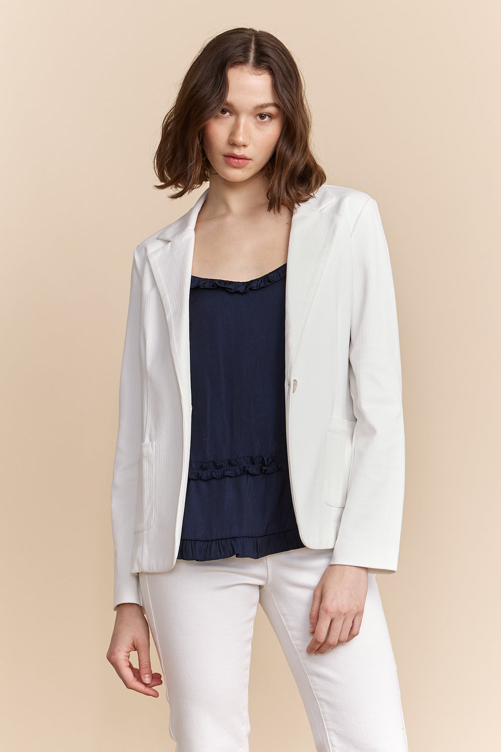 Fitted stretch blazer with applied pockets