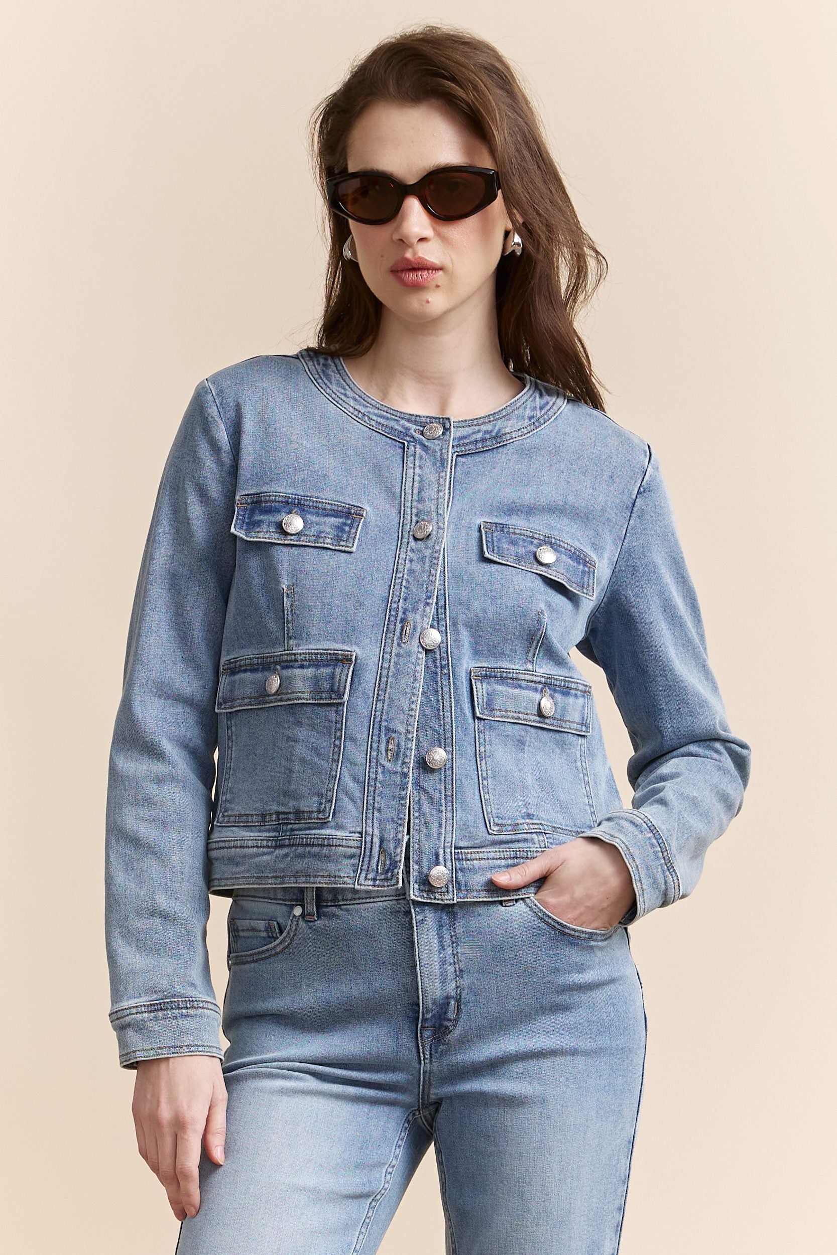 Denim jacket with applied pockets