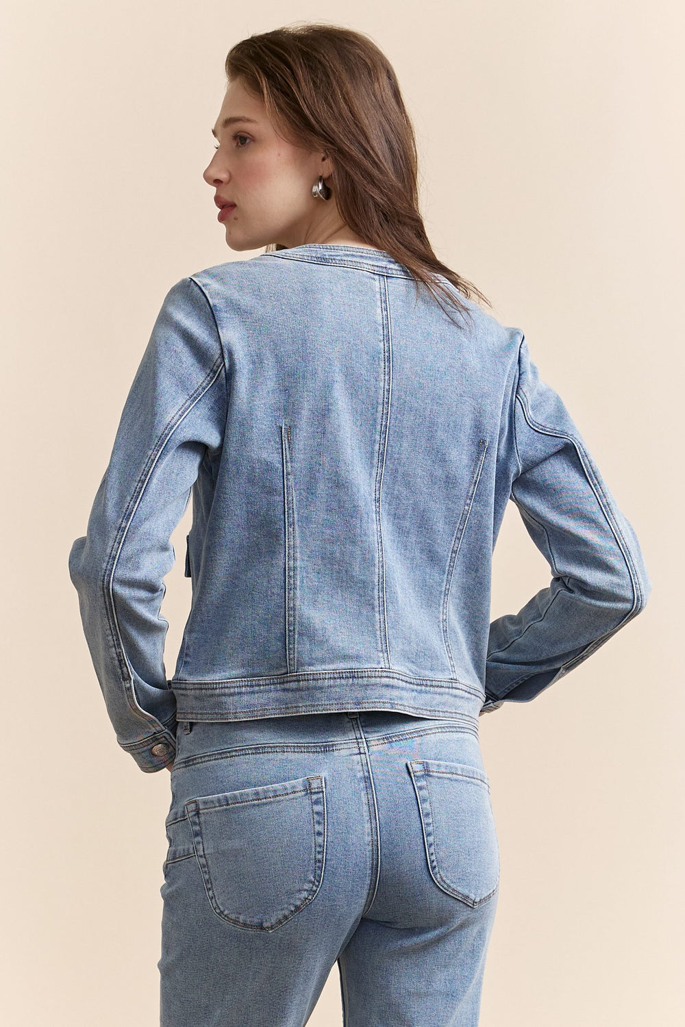 Denim jacket with applied pockets