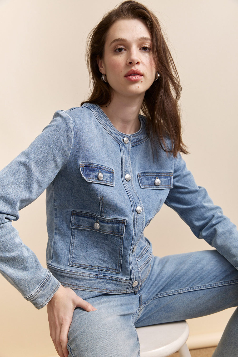 Denim jacket with applied pockets