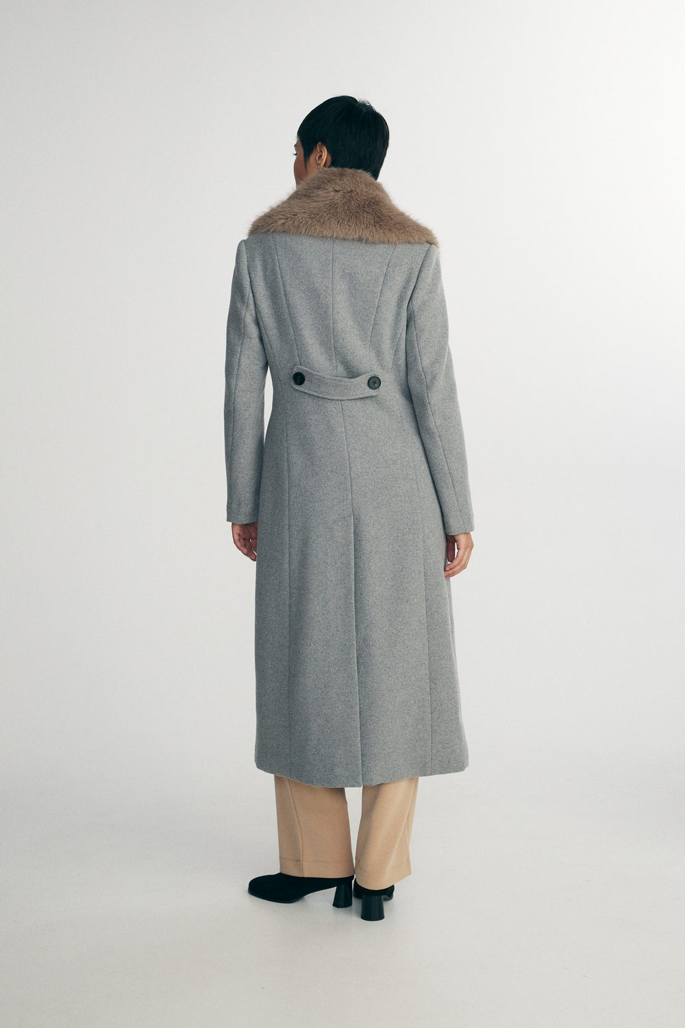 Long coat with detachable faux fur collar
