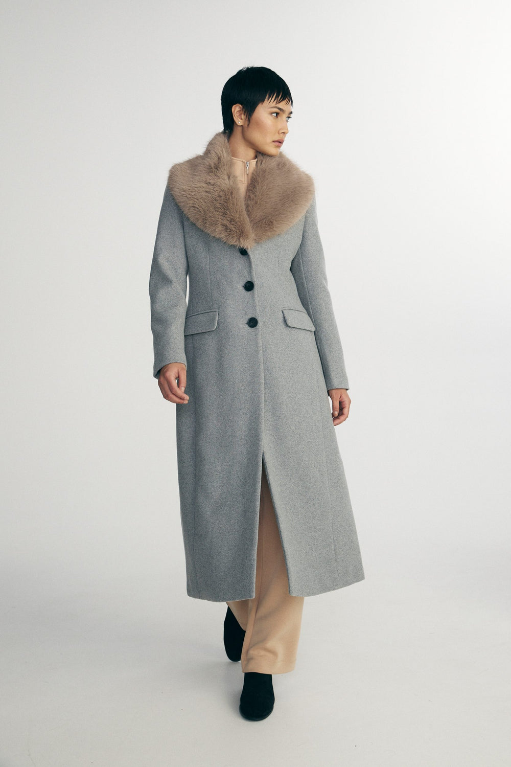 Long coat with detachable faux fur collar