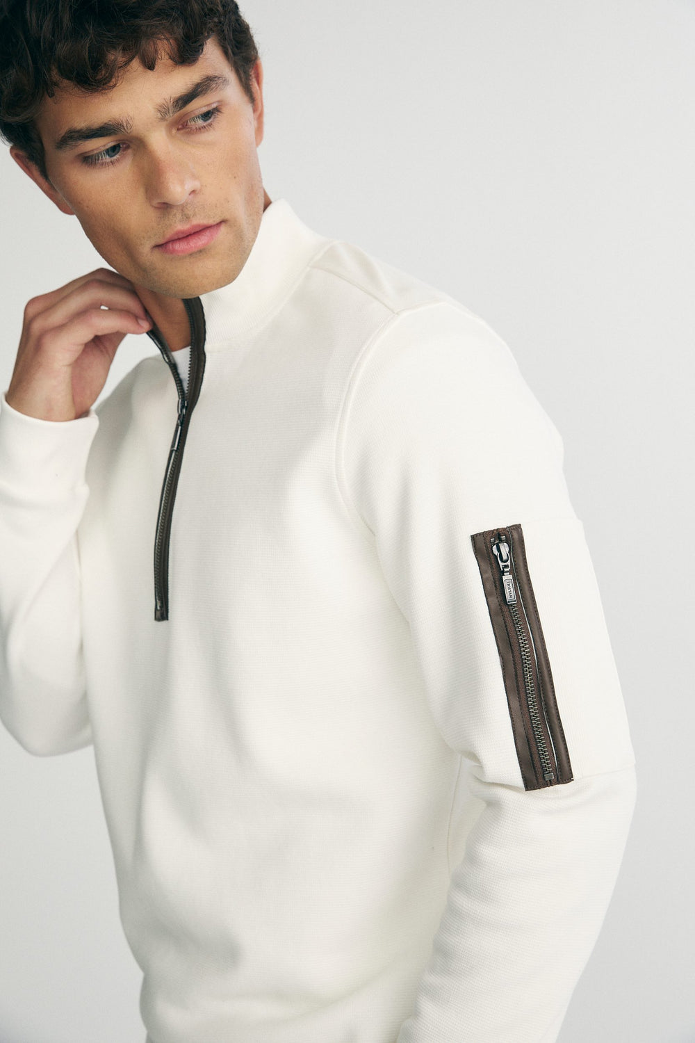 Half zip sweater with vegan leather