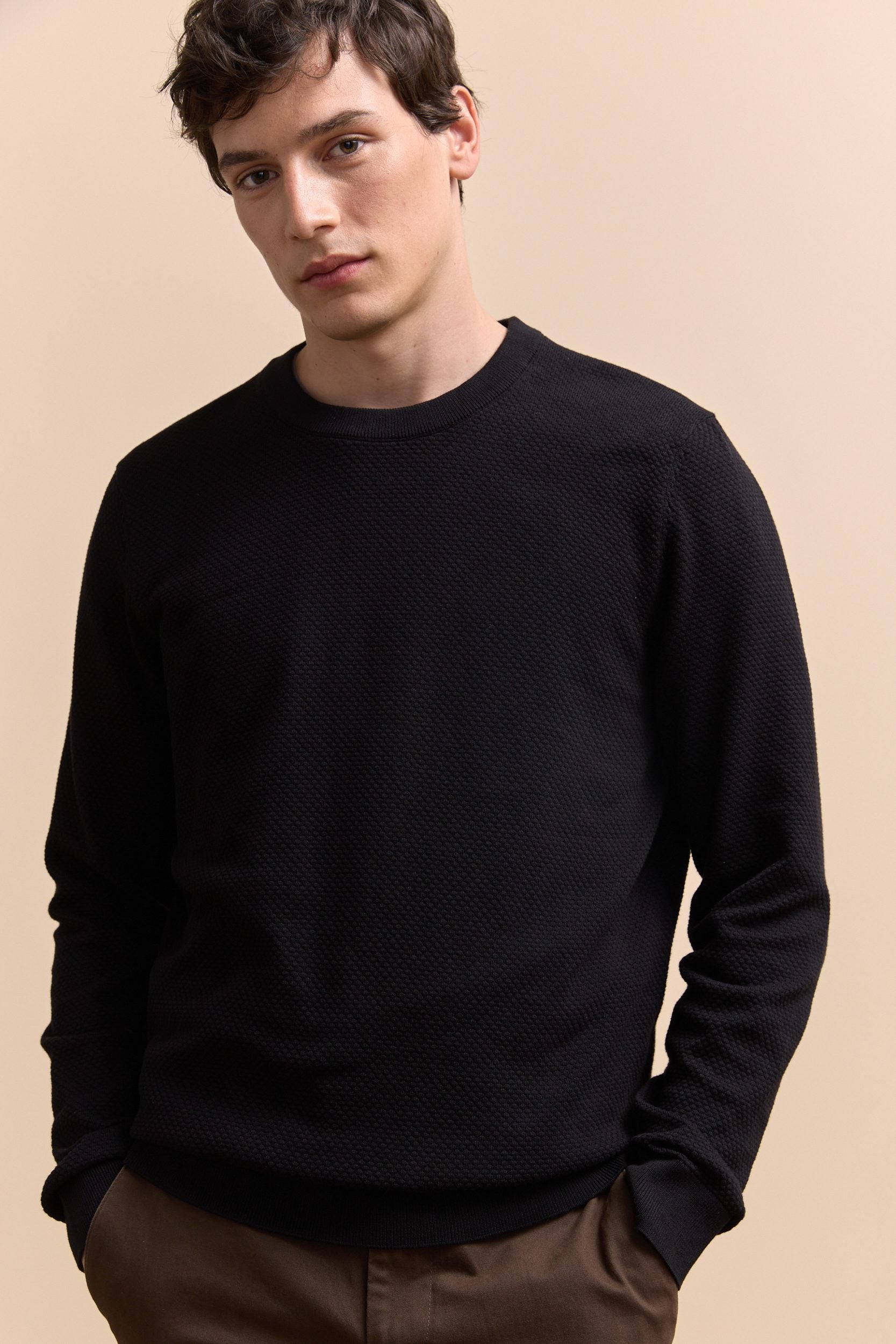 Textured crew neck sweater