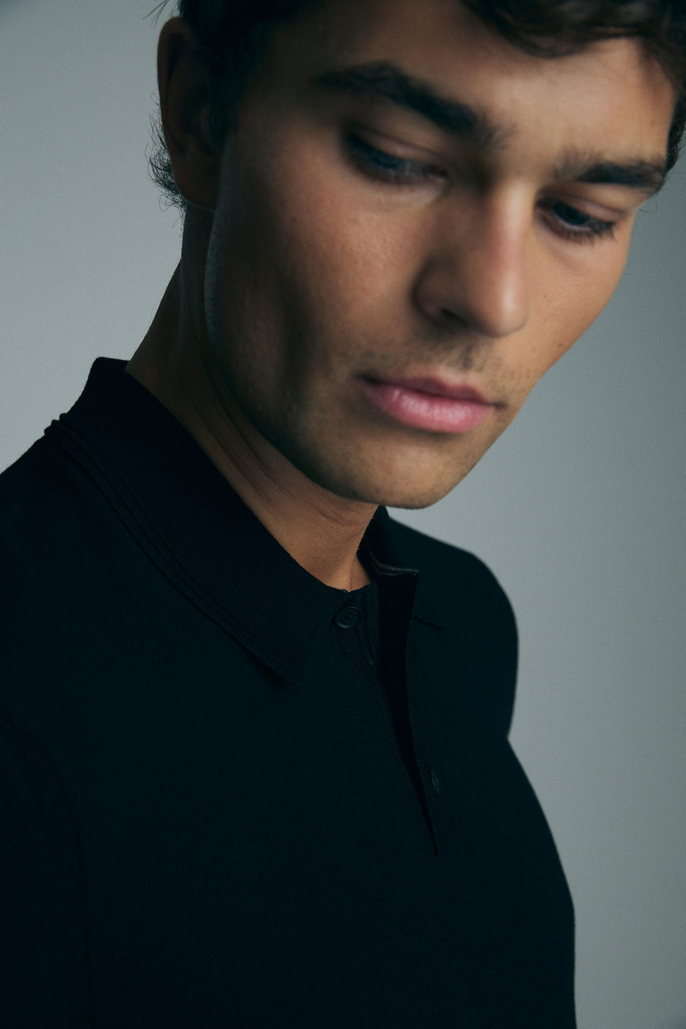 Solid color knitted polo