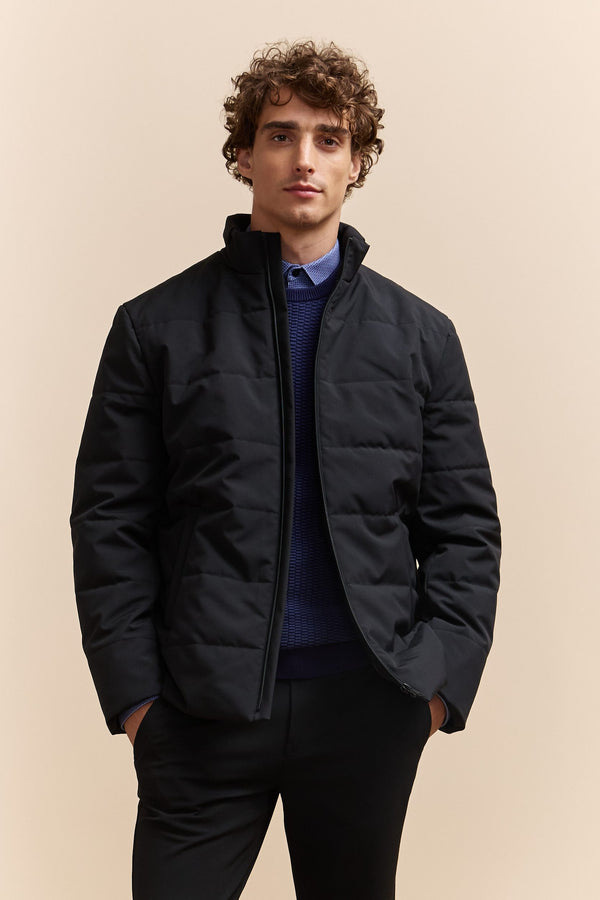 Quilted coat with zip closure