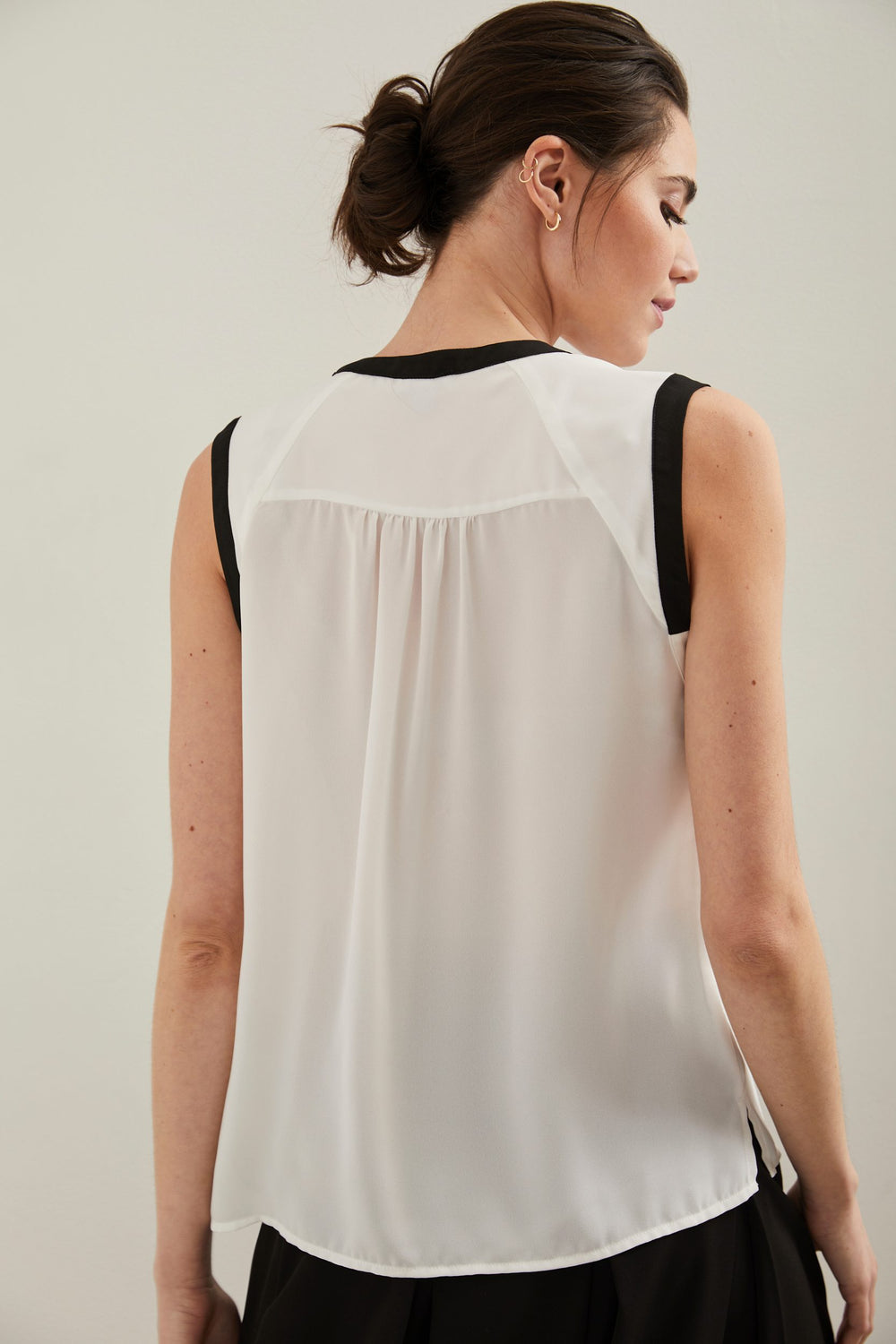 Sleeveless top with contrast detail