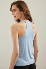 Sleeveless top with draped col