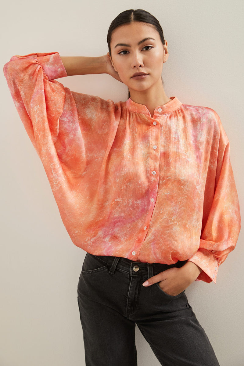 Oversized dolman blouse with puffy sleeves