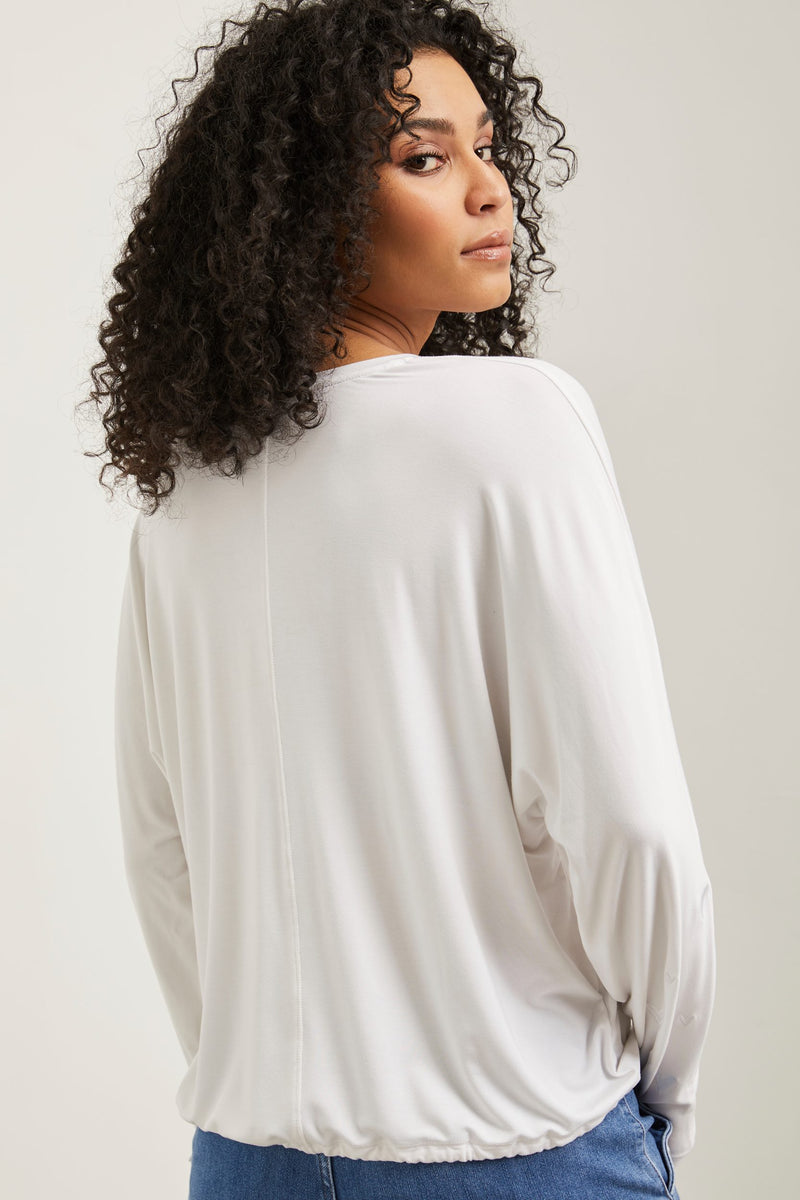 Dolman sleeve top with heart embroideries