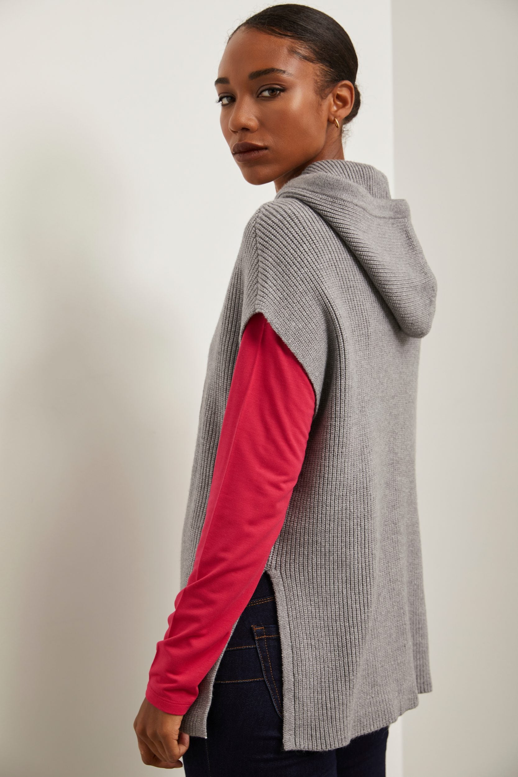 Sleeveless sweater with hood